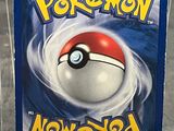 a plastic box with a picture of a pokemon ball inside of it