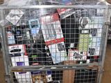 a metal cart with many items in it in a warehouse
