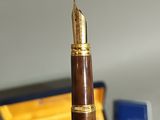 a pen that is sitting on top of a desk