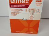 an image of a box of elmex dental care products on a table
