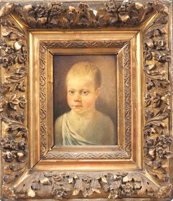 un tableau représentant un jeune garçon, dans un cadre doré