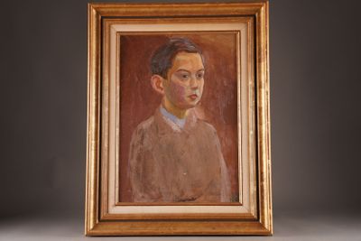 portrait of a man in a brown sweater and blue shirt in a gold frame