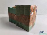 a cardboard box that has a bunch of books inside of it