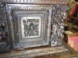 a large ornate silver piece on display in a shop