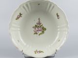 an image of a plate with flowers on it