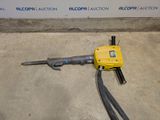 an image of a drill with a cord attached to it