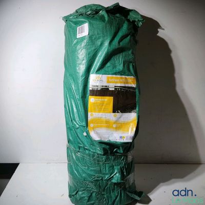 a green bag of food sitting on a table