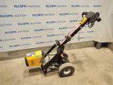 a close up of a small machine with a yellow box on it