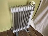 a radiator that is on the floor in a room