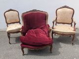 three chairs that are sitting next to each other