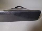 a black suitcase that is sitting on a table