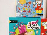 several children ' s books are stacked on top of each other