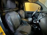 a view of the inside of a car from the driver ' s seat