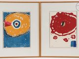 two paintings of donuts on display in a frame
