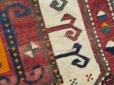a close up view of a colorful rug on the floor