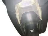 a picture of a close up of a motorcycle ' s exhaust pipe