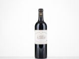 a bottle of wine that is sitting on a table