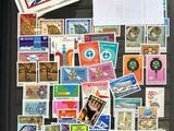 many different stamps on the table with a note on it