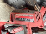 a red corded drill and a black corded corded corded corded corded corded corded corded corded corded corded