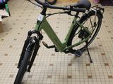a bike that is sitting on the floor in a store