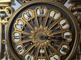 a clock that is sitting on the wall in the room