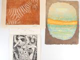 three prints of different types of artwork on a white surface