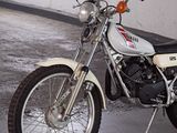 a motorcycle that is parked in a garage