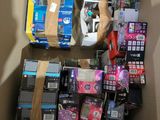 a cardboard box filled with assorted electronics and other items