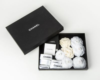 chanel gift set in a black box on a white background