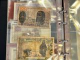 a picture of a book with a lot of money inside of it