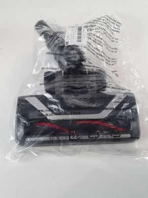 a close up of a vacuum cleaner in a bag on a table