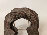 an image of a wooden sculpture of a horse ' s head on a stand