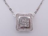 a white gold and diamond necklace with a square shaped pendant on a chain