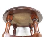 a small wooden stool with wooden legs and a wooden seat