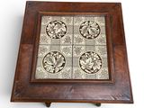 an image of a wooden box with a tile design on it