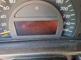 a close up of a speedometer on a car ' s dashboard