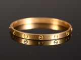 Bague « Love » Cartier en or jaune 18 carats