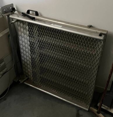a metal radiator that is sitting in a room