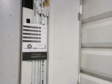 a white box with electrical equipment inside of it