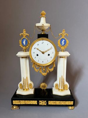 a clock that is sitting on top of a table