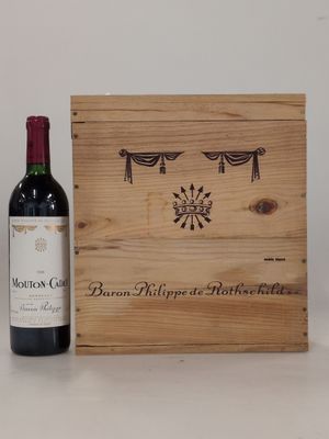 a wooden box with a bottle of wine next to it