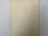 a close up of a piece of paper on a white surface