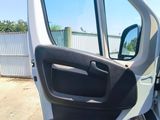 a car door open with the driver ' s side door open