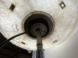 a light that is on in the ceiling of a building