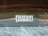 a sticker that says practice dummy on the windshield of a car
