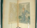 a open book with a picture of a woman and a dog on it