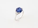an oval tanzane sapphire and diamond ring