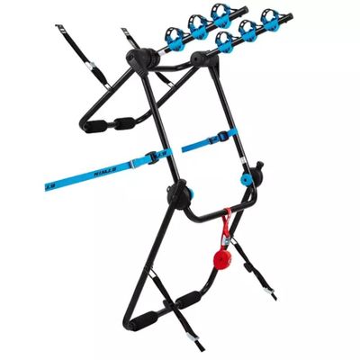 a close up of a bike rack with four bikes on it