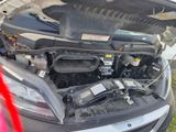 the engine of a car with its hood open and the hood open
