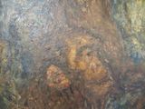 an oil painting of a man and a woman in a cave